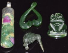 A nephrite jade Maori tiki, nephrite jade pendant, a nephrite jade pendant in the form of a kiwi and
