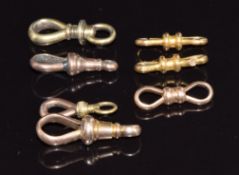 Eight yellow metal and 9ct gold clips, 9.3g
