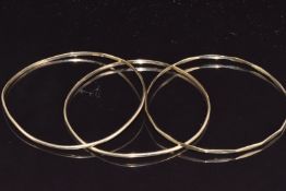 Three 9ct gold bangles, 11.6g