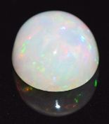 A loose round opal cabochon measuring 2.80ct