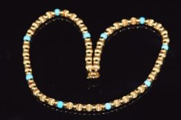 An 18ct gold necklace made up smooth and textured spherical links, 37.4g