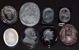 Eight smoky quartz, glass and similar carved cameos and intaglios, all depicting classical figures