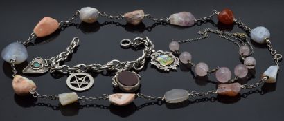 Edwardian silver charm bracelet with four charms including an enamelled cricket fob, swivel fob