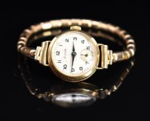 Avia 9ct gold ladies wristwatch with inset subsidiary seconds dial, blued hands, black Arabic