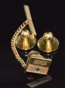 Two 18ct gold studs (3.3g) and a 9ct gold pin (1.5g)