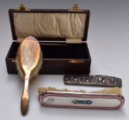 Danish white metal embossed comb and cover, an Art Deco guilloché enamel brush and a boxed comb