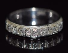 An 18ct white gold half eternity ring set with diamonds, 3.5, size M/N