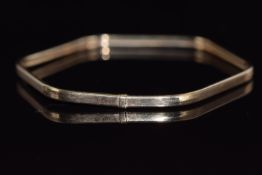A 9ct gold octagonal bangle, 4.6g