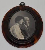 A tortoiseshell carved miniature photograph or portrait frame, overall height 9.5cm