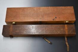 Two vintage wooden gun cases, both with fitted interiors, largest 105x26x10cm.