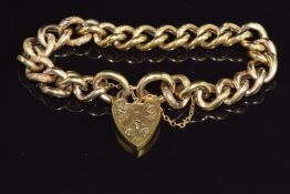 A 9ct gold curb link bracelet with alternating textured links and a heart padlock, 19g