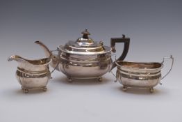 George V hallmarked silver three piece teaset with gadrooned edge, raised on four ball feet,