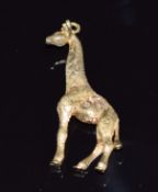 Franz Hirner 18ct gold pendant in the form of a giraffe set with two diamonds, 4 x 1.5cm, 13g