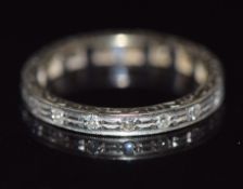 An 18ct white gold eternity ring set with diamonds, 2.8g, size M