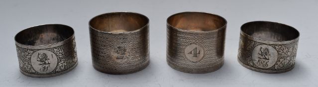 Two pairs of hallmarked silver napkin rings, one pair being Victorian, weight 133g