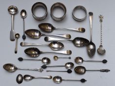Hallmarked silver and white metal tea and other spoons and three napkin rings, Georgian and later,