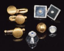 An 18ct gold stud set with mother of pearl and a sapphire (1.4g), a 9ct gold cufflink set with