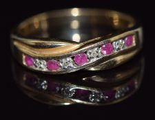 A 9ct gold ring set with diamonds and rubies in a twist setting, 2.8g, size O