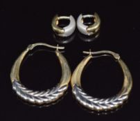 A pair of 14ct bi-coloured earrings (3.4g) and a pair of 9ct gold earrings (1.8g)