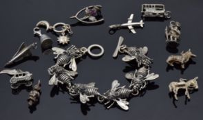 A silver bracelet made up of bee links, a silver thistle brooch by WBs and a quantity of silver