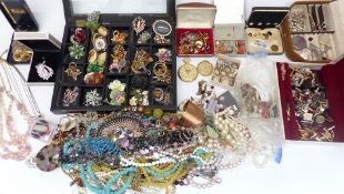 A collection of costume jewellery including earrings, brooches including vintage, micro mosaic,