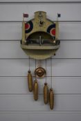 A 'Royal Air Force' cuckoo clock, the cuckoo as a Spitfire aeroplane, H26cm
