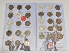 Twenty four £2 coins in a 'Great British Coin Hunt' folder, includes Manchester Commonwealth Games