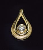 An 18ct gold tear drop pendant set with a round cut diamond of approximately 0.49ct, with