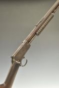 Winchester Model 1890 .22 pump-action rifle with adjustable sights and 24 inch octagonal barrel