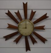 Paico Sunburst wall clock with Arabic ivory coloured dial, maximum diameter 42cm