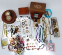 A collection of costume jewellery including Services pocket watch and wristwatch, brooches,