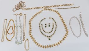 A collection of designer necklaces including Monet, A&S, etc