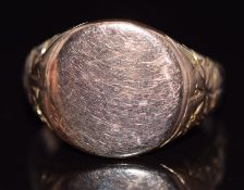 A 9ct rose gold signet ring with engraved shoulders, 5.6g, size J