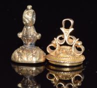 A 9ct gold fob set with onyx and a Victorian fob set with carnelian agate