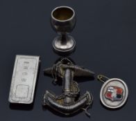 A silver money clip, silver brooch, etc