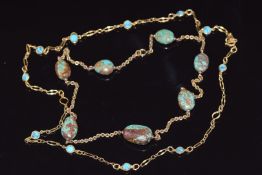 Two rolled gold necklaces set with turquoise