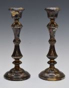 Pair of Elizabeth II hallmarked silver candlesticks, Birmingham 1961, maker W I Broadway & Co,
