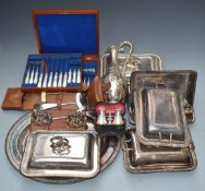 Silver plated ware including a claret jug, tray, entrée dishes including Elkington, two 'from the