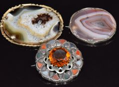 Scottish silver brooch set with specimen agate and two Victorian brooches set with agate