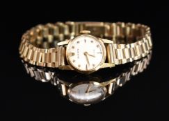 Rolex 9ct gold ladies wristwatch ref. 8648 with gold hands and star hour markers, silver dial and