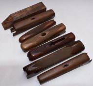 Six Beretta, Browning, Remington or similar chequered shotgun forends together with a walnut