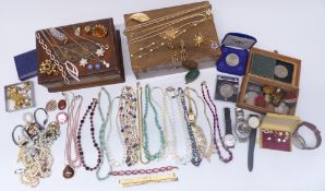 A collection of costume jewellery including earrings, beads, Art Deco necklace, etc
