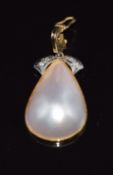 A 9ct gold pendant set with a pearl and diamonds, 3.4g