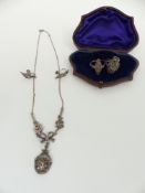 A suite of silver jewellery set with marcasite
