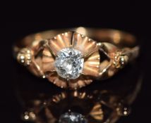 A c1900 yellow metal ring set with a European old cut diamond of approximately 0.35ct, 2.9g, size N