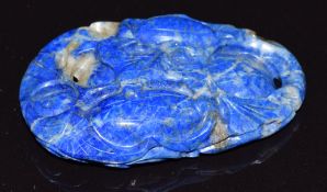 A caved lapis lazuli pendant,16.2g, 4.5 x 3cm