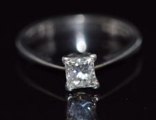 A platinum ring set with a princess cut diamond of approximately 0.62ct, size I/J, 4.1g