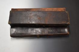 Three vintage leather bound shotgun cases, including one with Army & Navy label and one with