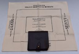 Westley Richards leather rifle cartridge wallet together with a matching cleaning cloth.