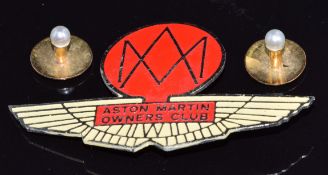 Two 18ct gold studs set with a pearl to each in original box, and an Aston Martin Owners Club badge